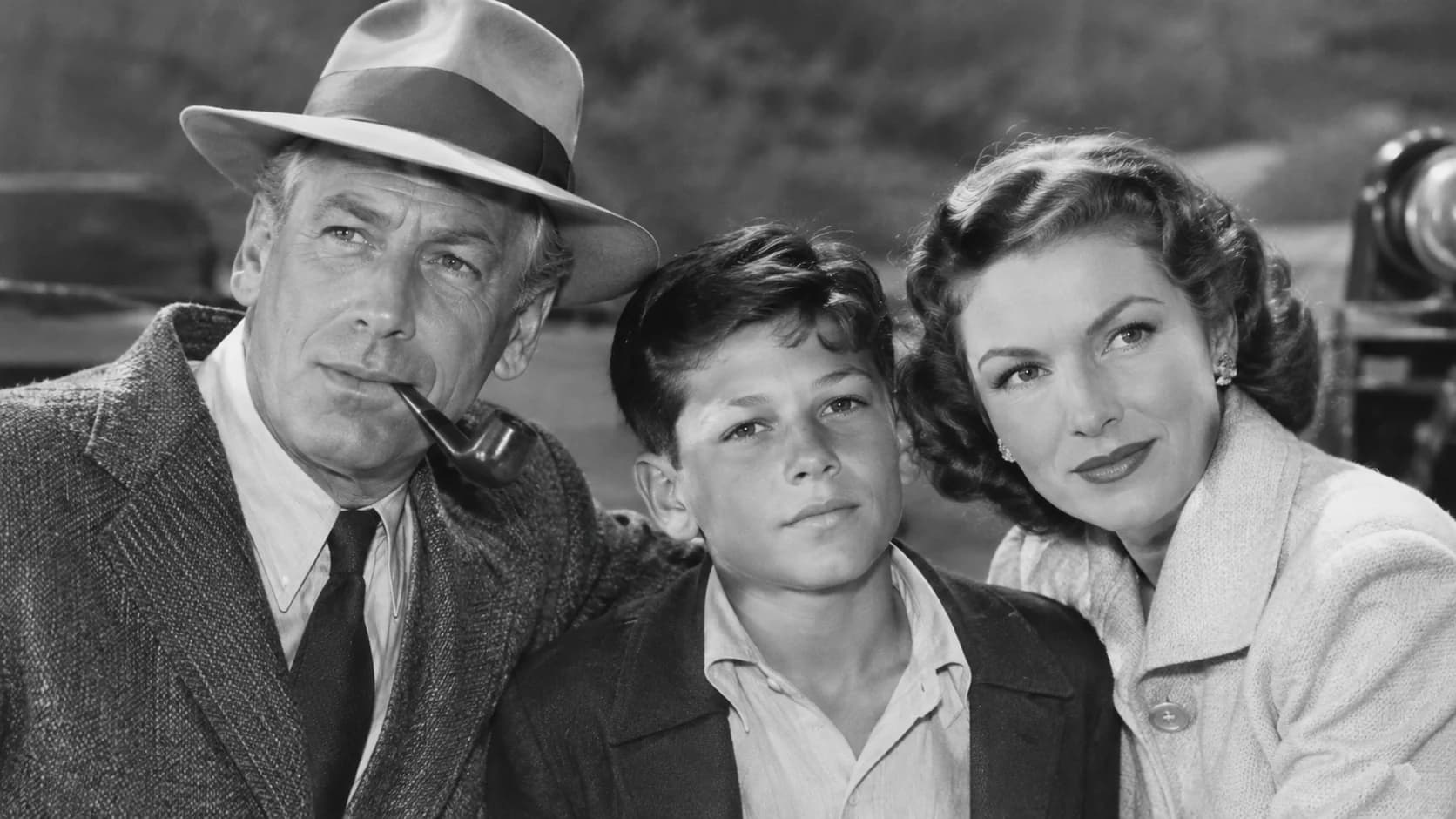 Pablo Huston, adopted son of filmmaker John Huston and actress Evelyn Keyes, in a vintage Hollywood family portrait concept.